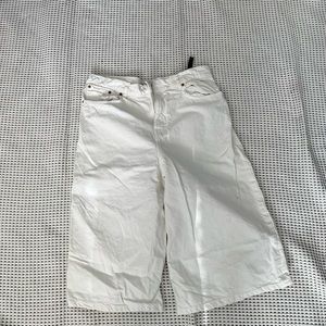 70s style white shorts.